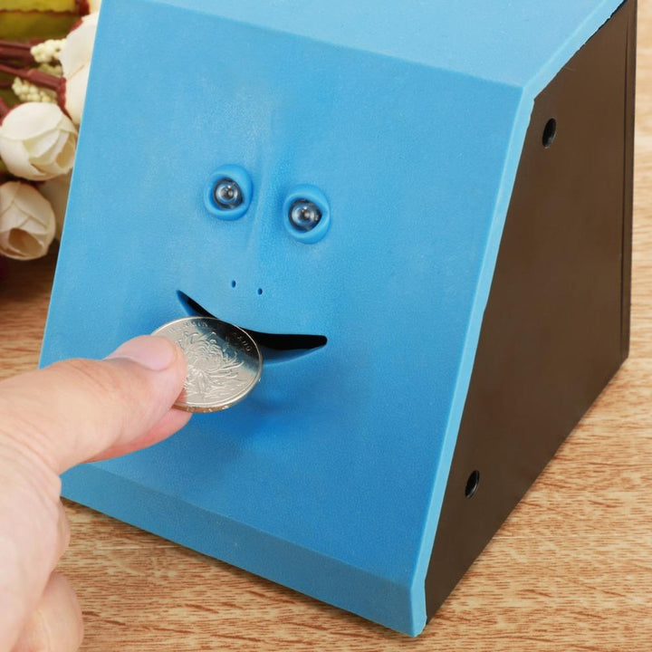 Einzigartige Grusel-Sparbüchse für Kinder, die Münzen 'isst'. Ideal als Facebank Geschenkidee zur Finanzerziehung.