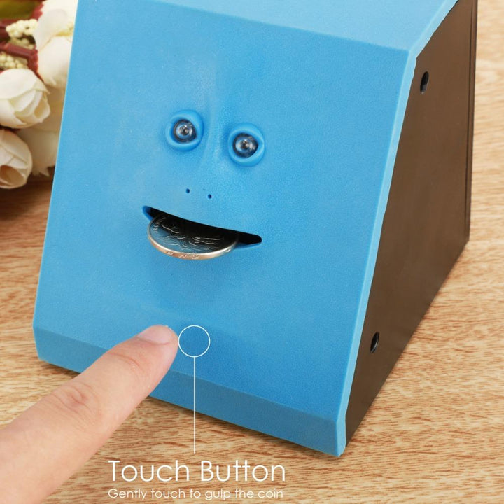 Interaktive Grusel-Sparbüchse für Kinder, eine Facebank die Münzen verschluckt. Fördert spielerisch das Sparen.