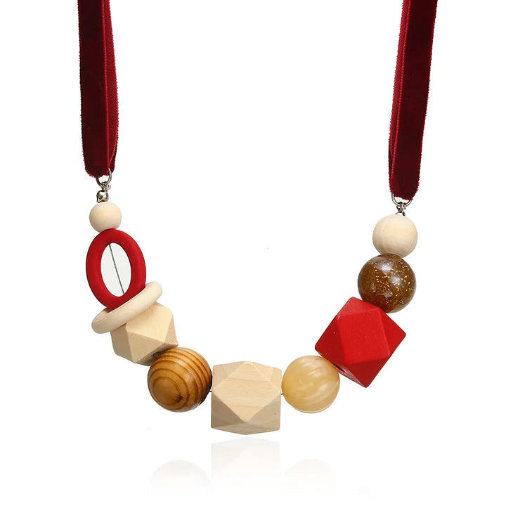 Einzigartige Damen Halskette: geometrische Holzperlen, farbenfroh und modern, perfektes Boho Schmuck Accessoire.