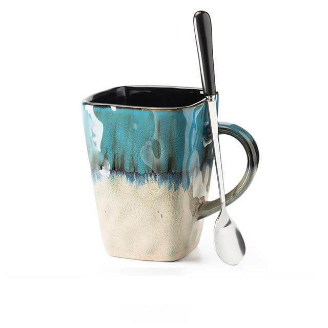 Handgefertigte Porzellantasse mit exquisiter Fließglasur. Einzigartige Kaffeetasse für stilvollen Genuss.