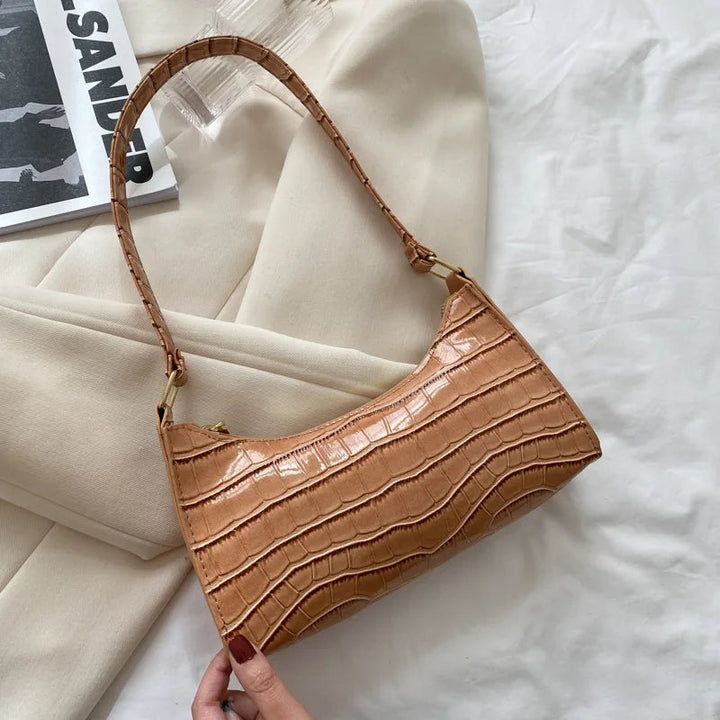 Stylische Retro Schultertasche für Damen in Marineblau, vielseitig kombinierbar für jeden Anlass.