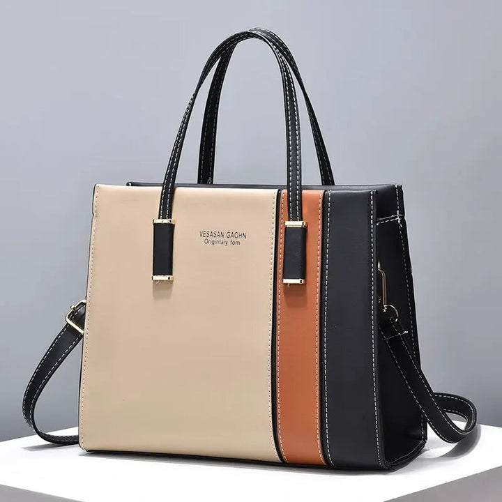 Vielseitige Crossbody-Tasche im Patchwork-Stil für Damen. Ideal für jeden Anlass, ein stilvolles Mode-Statement.