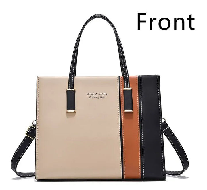 Moderne Damentasche: Elegante Patchwork Handtasche. Ein stilvolles Accessoire, das Vielseitigkeit bietet.