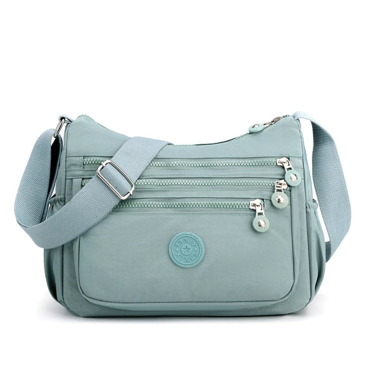Elegante Damen Handtasche, wasserabweisend, mit verstellbarem Schultergurt. Praktischer Begleiter für jeden Tag.