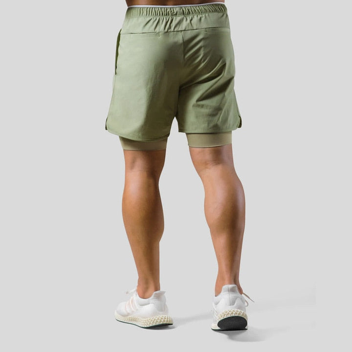 Seitenansicht der Herren 2-in-1-Trainingsshorts Mauro mit sportlichem Schnitt und Logo.