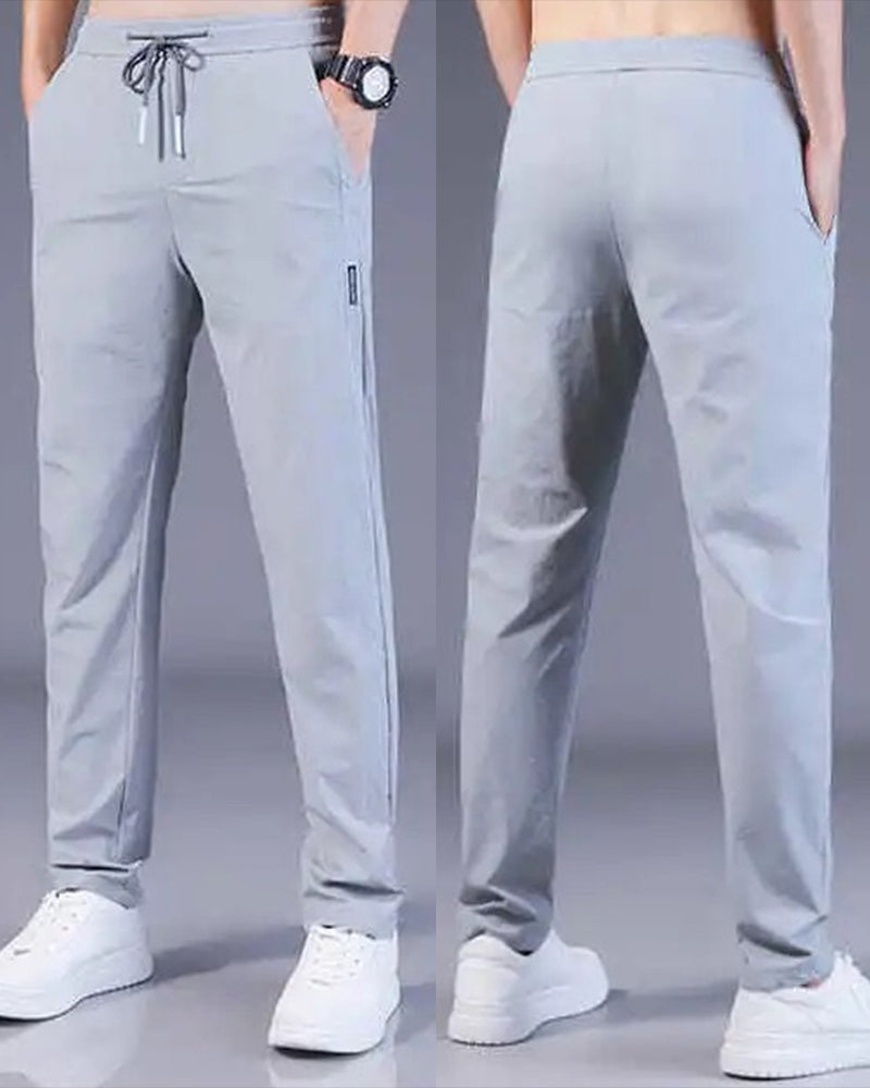 Stofftextur der AeroFlex Herrenhose. Schnelltrocknendes Stretch-Material für Komfort und Bewegungsfreiheit.