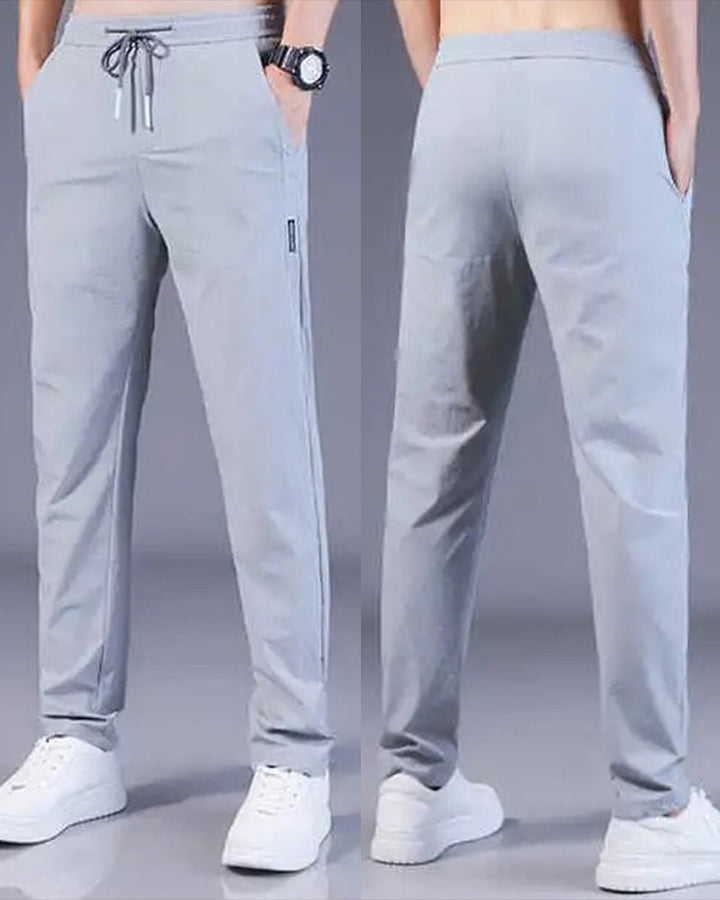 Stofftextur der AeroFlex Herrenhose. Schnelltrocknendes Stretch-Material für Komfort und Bewegungsfreiheit.