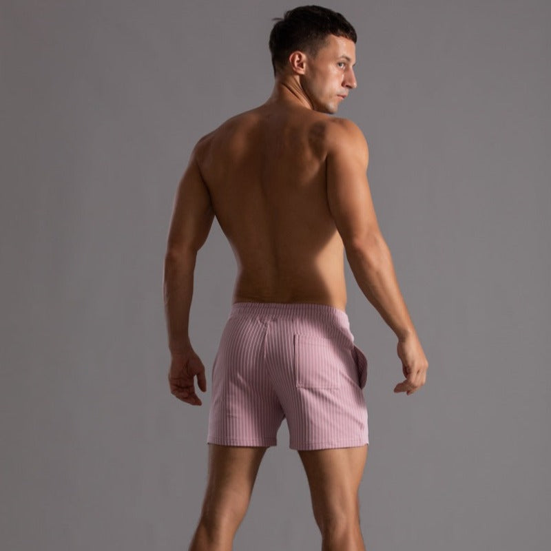 Herren Badeshorts in Marineblau, kurz, schnelltrocknend, ideal für Sommer-Aktivitäten.