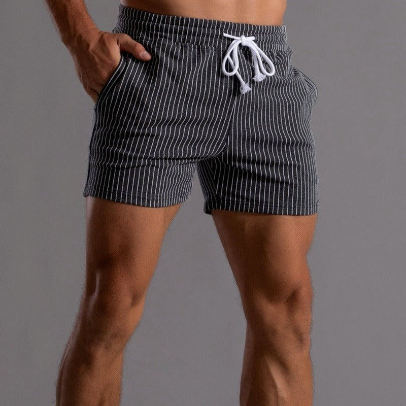 Kurze Badehose Herren, orange, schnelltrocknend, sportlich, für Strand und Pool.