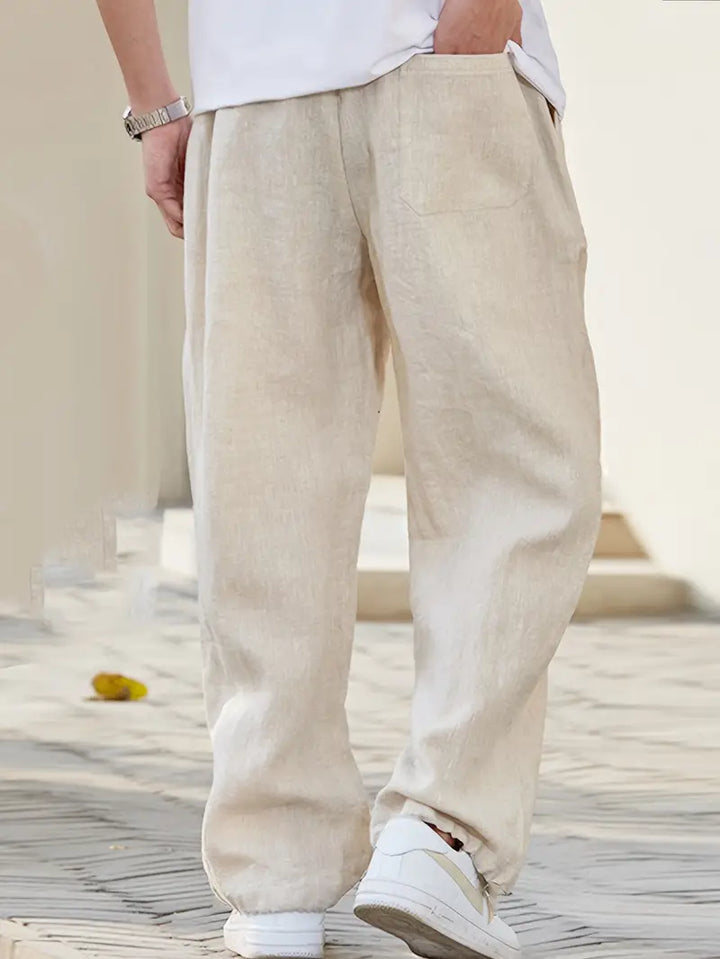 Lässige Herren Baggy-Hose in Beige, perfekte Sommerhose für entspannte Tage & urbanen Streetwear-Look.