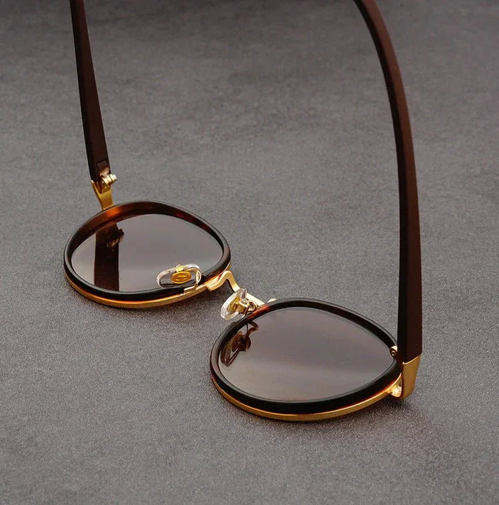 Stilsichere Herren Retro-Sonnenbrille mit UV400 Schutz, ein Zeichen für guten Geschmack und Funktionalität.