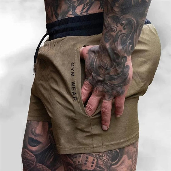 Graue Herren Gym Shorts für optimalen Komfort beim Training, Laufen & Sport. Mit Seitentaschen.
