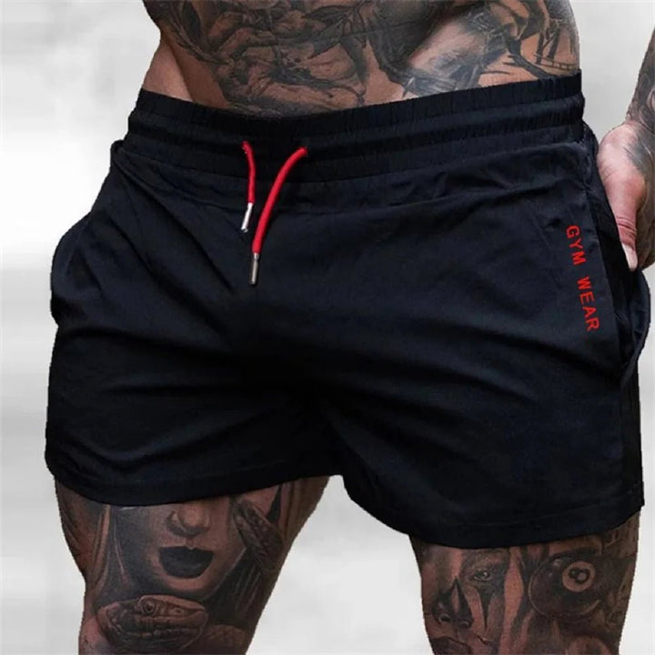 Schwarze Herren Aktive Shorts mit elastischem Bund, Seitentaschen. Perfekt für Sport & Freizeit.