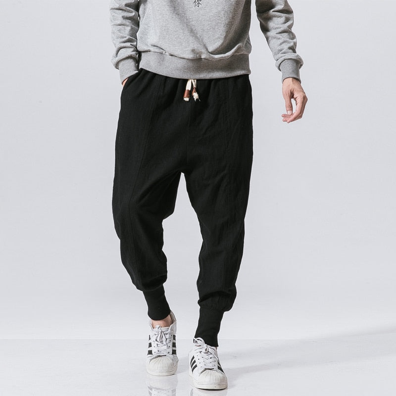 Herren Harem Jogginghose in Schwarz, lässig & bequem für Urban Streetwear Looks.