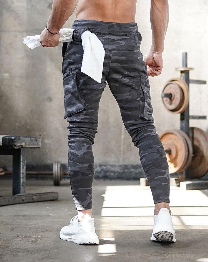 Herren Hose: Bequemer Jogger mit Kordelzug & Reißverschluss-Details am Beinabschluss.