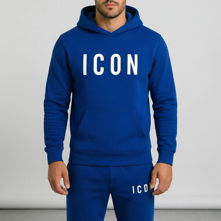 Graues Herren Hoodie & Jogger Set aus kuscheligem Material, stylisch und bequem für Zuhause.