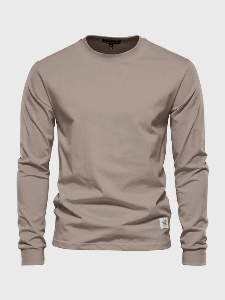 Herren Langarmshirt mit Rundhalsausschnitt in Schwarz. Klassisches Basic für Alltag & Freizeit, bequem & vielseitig.