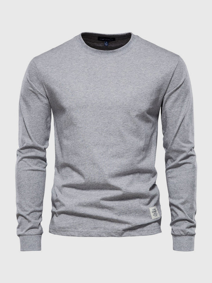Trendiges Herren Langarmshirt mit Rundhalsausschnitt, Braun. Für einen lässigen, modernen Look in Frühling und Herbst.