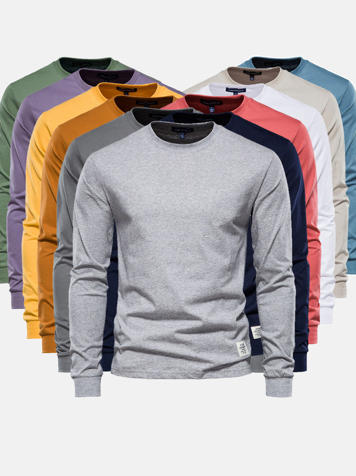 Stylisches Herren Langarmshirt mit Rundhalsausschnitt in Weiß. Perfektes Basic für jede Jahreszeit, modern & schlicht.