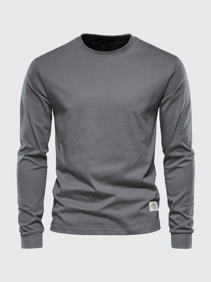 Zeitloses Herren Langarmshirt mit Rundhals, Grün. Ein Basic, das in keiner Herrengarderobe fehlen darf, vielseitig kombinierbar.