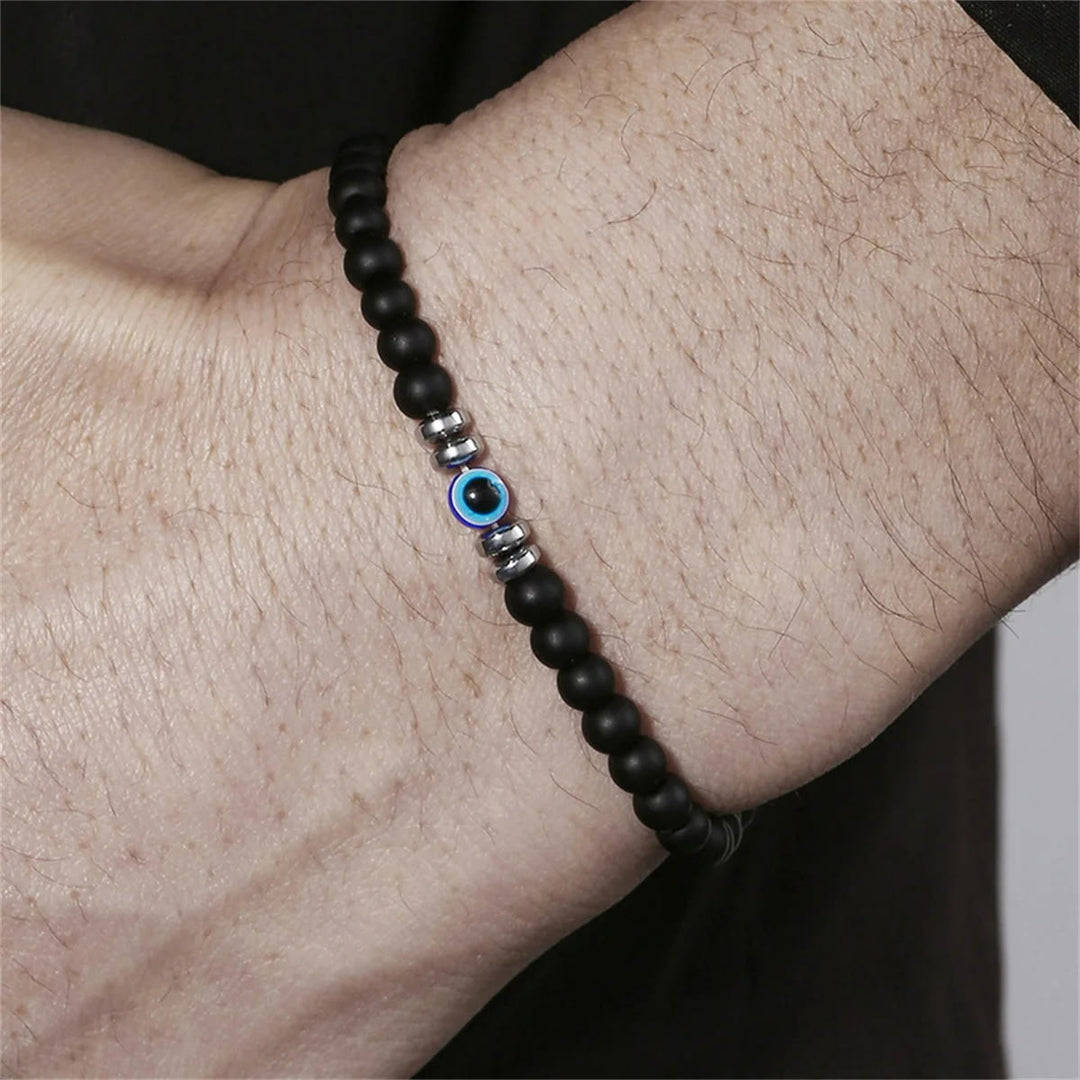 Herren Natursteinarmband mit Böse-Auge Perle: Schutz & Stil für den modernen Mann.