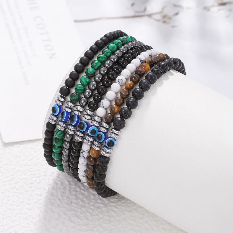 Modernes Natursteinarmband für Herren: Hämatit, Malachit, Onyx mit Böse-Auge Symbol als Akzent.