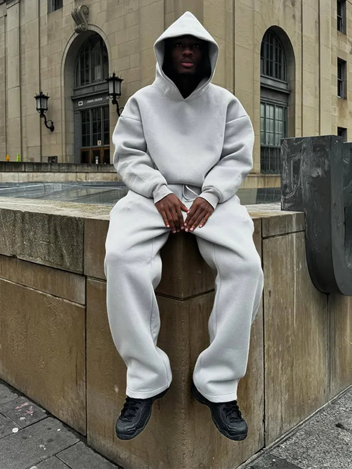 Bequemer Herren Oversized Loungewear Trainingsanzug mit Kapuzenpullover und Jogger Hose.