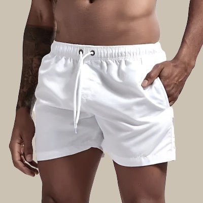 Marineblaue Herren Schwimmshorts, schnelltrocknend, mit elastischem Bund für den Sommer.