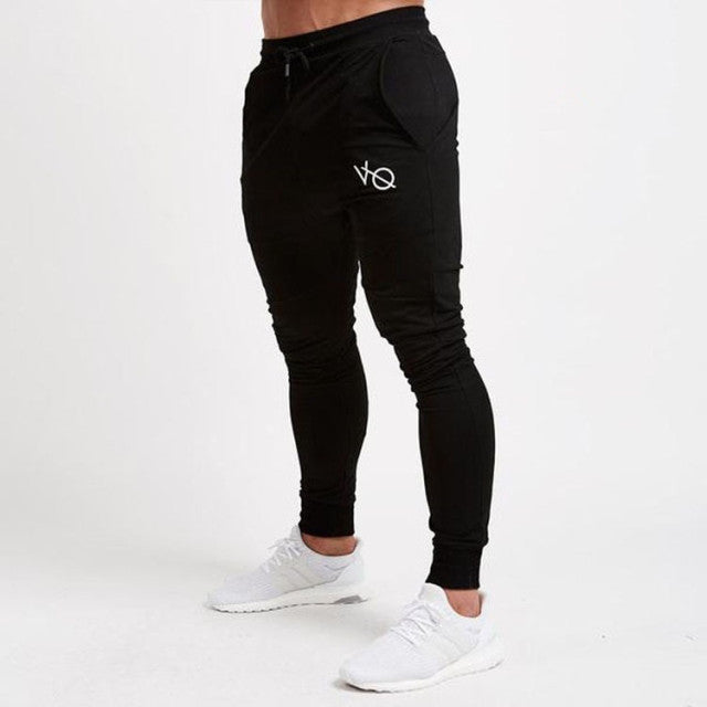 Herren Sporthose Slim Fit in Grau, perfekt für intensive Trainingseinheiten & Laufen.