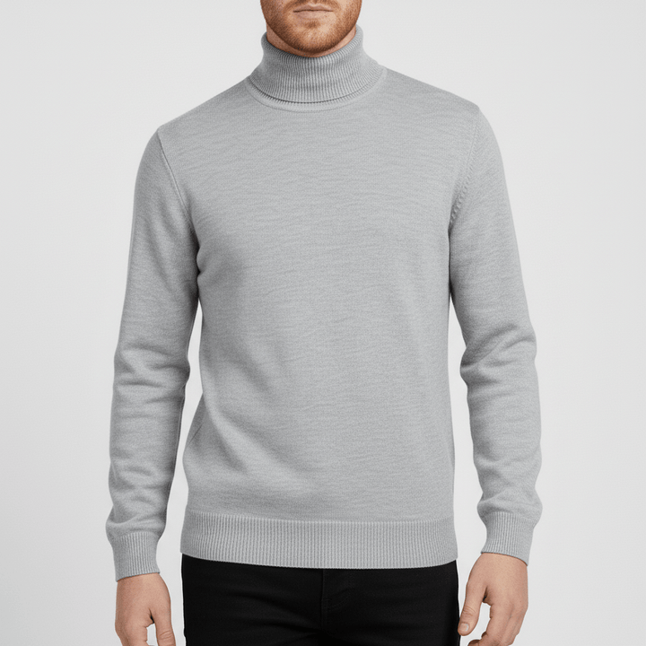 Eleganter schwarzer Slim-Fit Rollkragenpullover für Herren. Passt ideal zu Anzügen oder Jeans.
