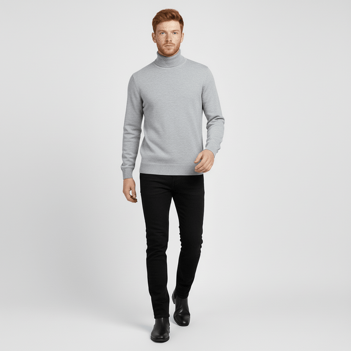 Moderner schwarzer Rollkragenpullover für Herren in Slim-Fit-Passform. Ideal für Herbst/Winter.
