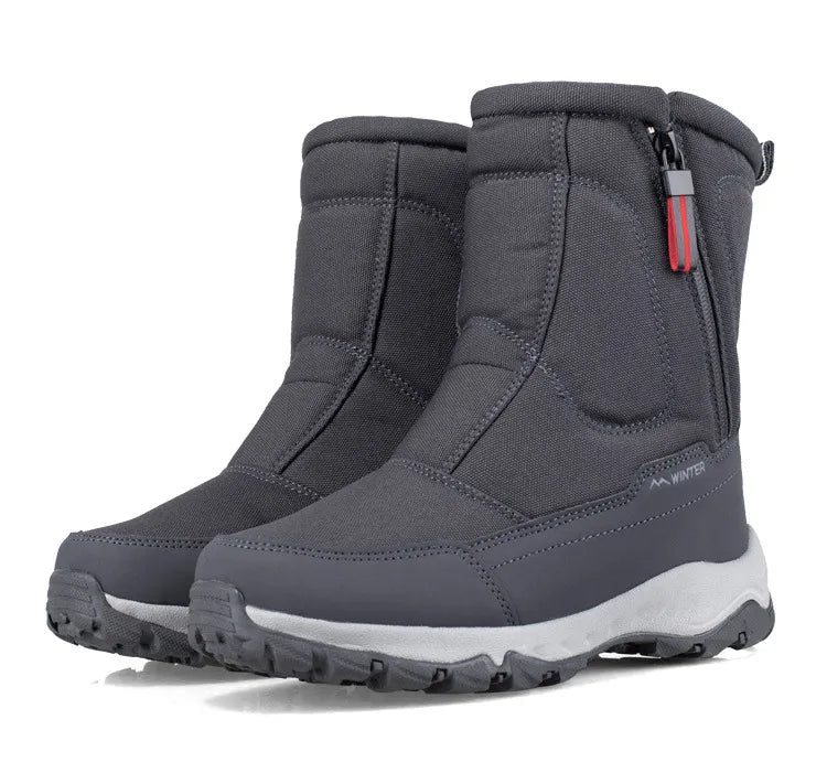 Halbhohe Herren-Schneestiefel mit warmer Isolierung. Wasserabweisend, komfortabel für kalte Wintertage.
