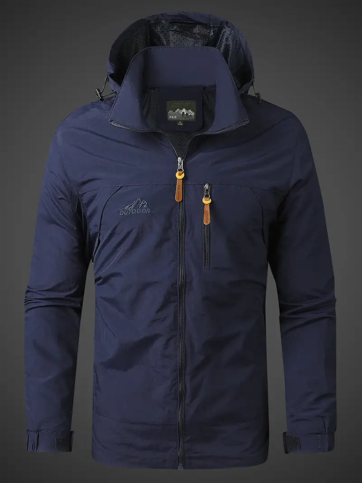 Robuste Herren Regenjacke für Wandern & Trekking. Schützt vor Wind, Nässe & ist atmungsaktiv.
