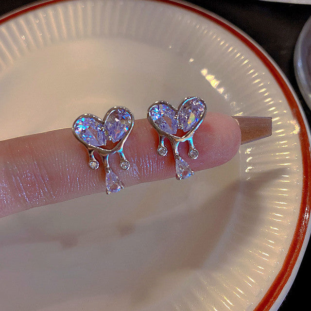 Trendiger Damenschmuck: Halskette mit Tropfen, Herz, Schmetterling & dazu passende Ohrringe.
