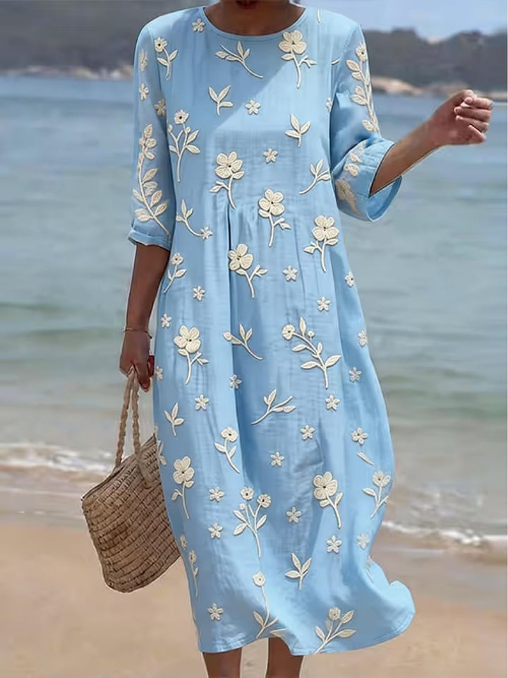 Himmelsblaues, besticktes Damen Midikleid mit Halbarme im eleganten A-Linien-Schnitt für Frühling/Sommer.