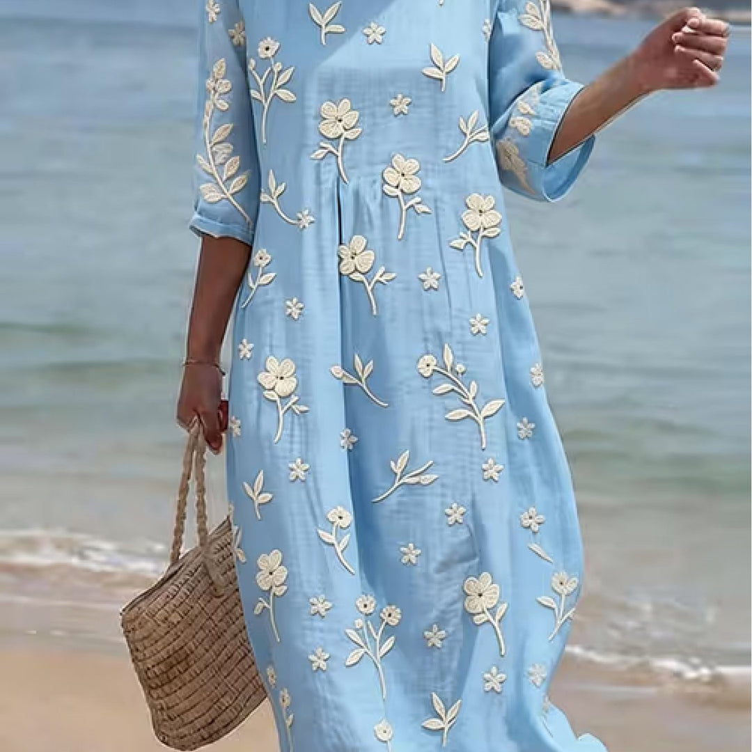 Elegantes besticktes Damen Midikleid mit Halbarme, hellblau, ideal als Sommer- oder Freizeitkleid.