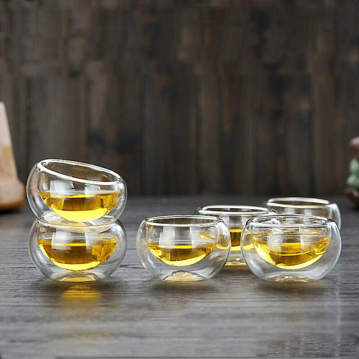 Vielseitige Glas Teekanne mit Teesieb für losen Tee oder Beutel. Doppelwand-Design hält Getränke lange heiß.