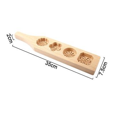 Schöne Holzformen für Weihnachtsplätzchen, bringen Freude ins Backen zur Weihnachtszeit.