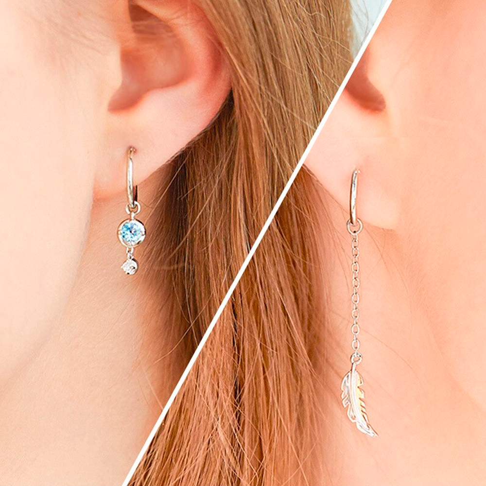 Handgefertigte asymmetrische Damen Federohrringe aus Sterlingsilber mit edlem Mondstein, einzigartiger Schmuck.
