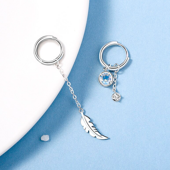 Modische Federohrringe für Damen aus Sterlingsilber mit Mondstein, stilvolles Modeaccessoire für jeden Anlass.