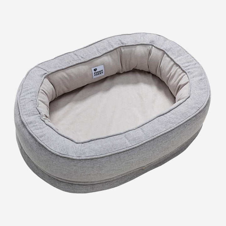 Effizienter Donut-Hundebettbezug, Polyester, waschbar, für problemlose Tierhygiene und Pflege.
