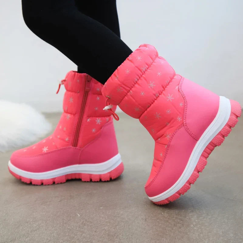 Wasserdichte Mädchen-Schneestiefel mit optimaler Wärmeisolierung und griffiger, rutschfester Sohle.