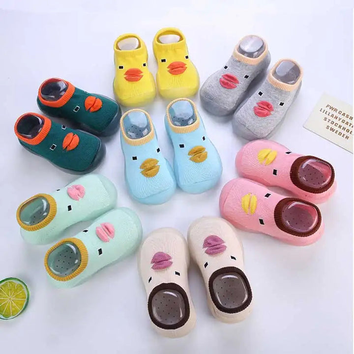 Rutschfeste Babyschuhe in Blau mit bequemer Passform für sichere erste Schritte.
