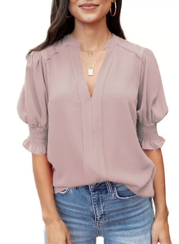 Vielseitiges Damen-Oberteil: Boho-Bluse mit V-Ausschnitt und Puffärmeln für stilvolle Auftritte.