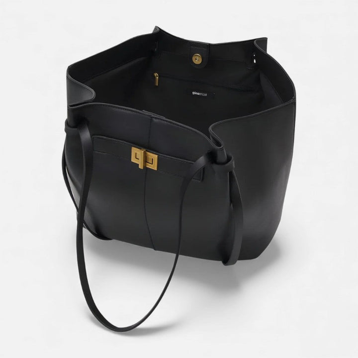 Praktische Damen Handtasche Shopper aus Kunstleder, geräumiger Innenraum mit Fächern für Ordnung.