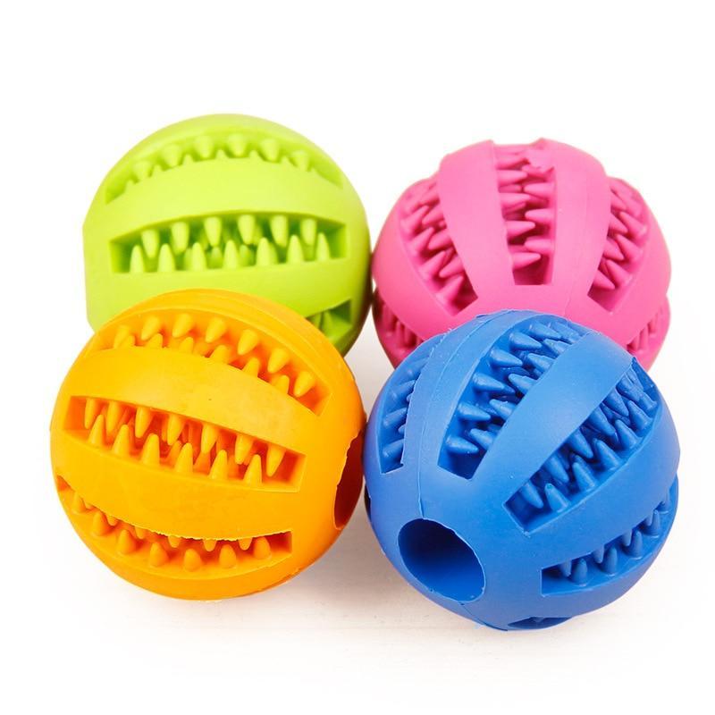 Grüner Kauspielzeug-Gummiball für Hunde zur effektiven Zahnreinigung und Zahnpflege. Fördert Mundhygiene.