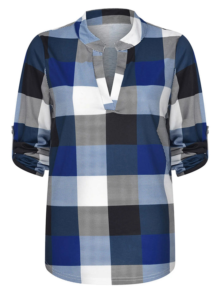 Karierte Damenbluse mit V-Ausschnitt, lange Ärmel, bequemer Schnitt. Ideal für Herbst & Frühling.