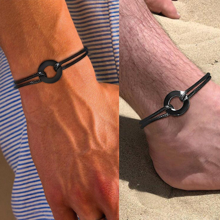 Robustes Herren Armband aus echtem Leder mit poliertem Edelstahlverschluss; langlebiges Statement.