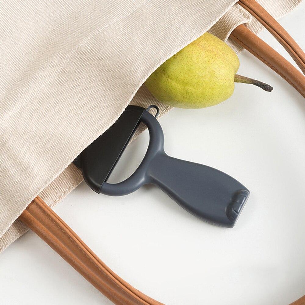 Moderner Katzenschäler, schwarz-graues Design. Ergonomischer Gemüseschäler und Küchenschäler für schnelles und einfaches Schälen.