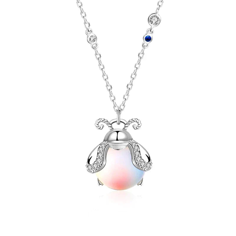 Besondere Geschenkidee: Damen Glühwürmchen-Halskette mit leuchtendem Mondstein, Edelsteinschmuck für Momente.